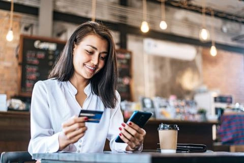 A lady trying to open her online bank account in Saudi Arabia A lady trying to open her online bank account in Saudi Arabia