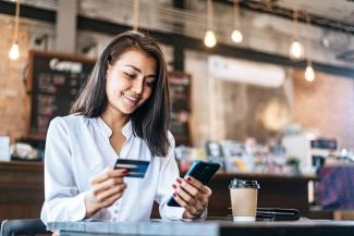 A lady trying to open her online bank account in Saudi Arabia A lady trying to open her online bank account in Saudi Arabia